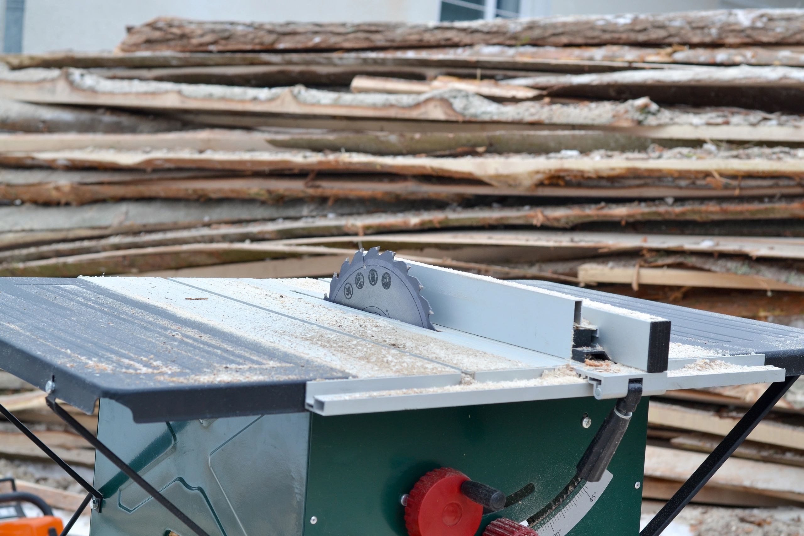 Stacks of timber at a sawmill representing lumber supply